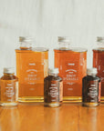 La gamme complète de sirop d'érable pur de l'entreprise Trace - Érable & Territoire.
