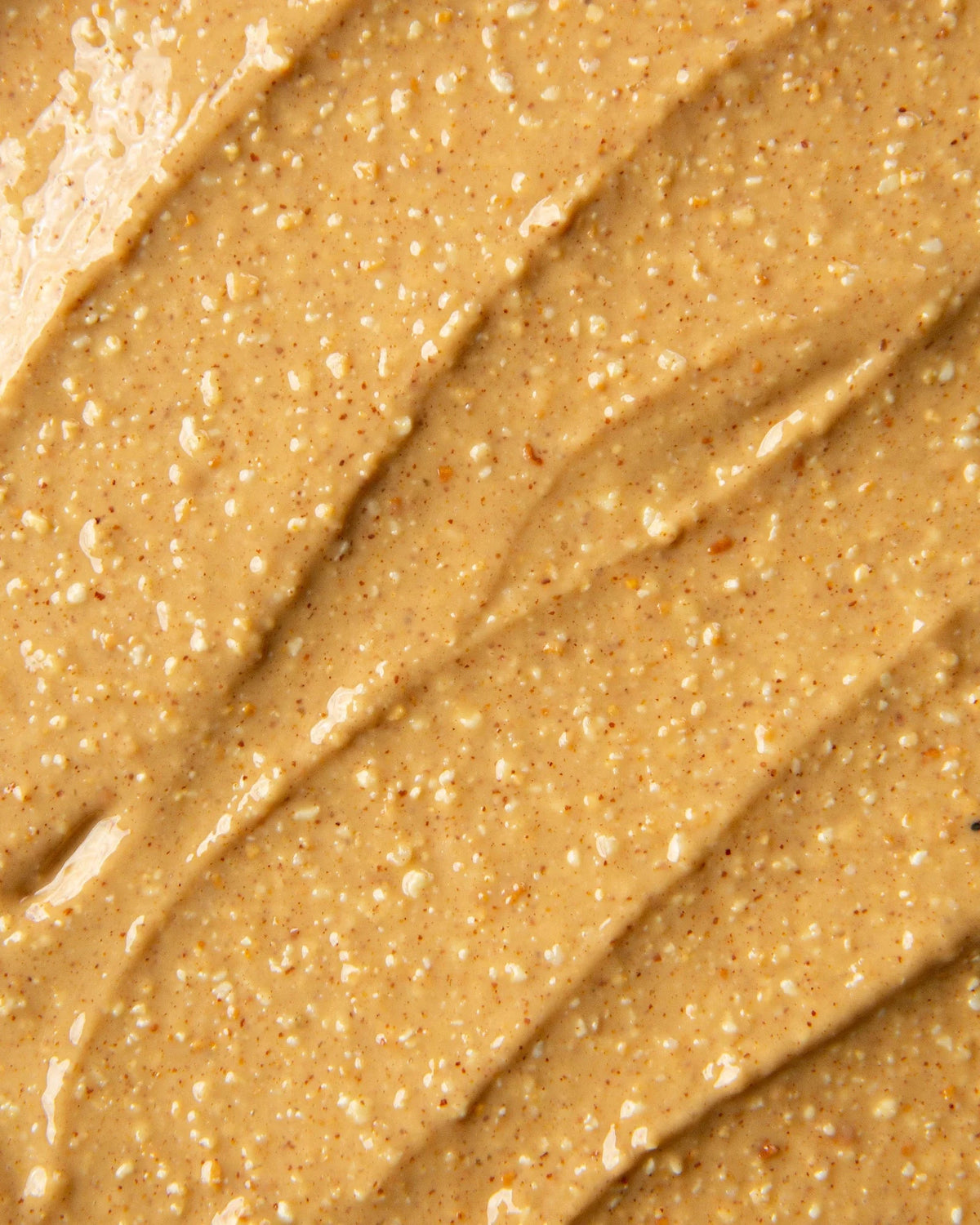 Une photo de la texture du beurre d'arachides et sel de mer de Logan petit lot.